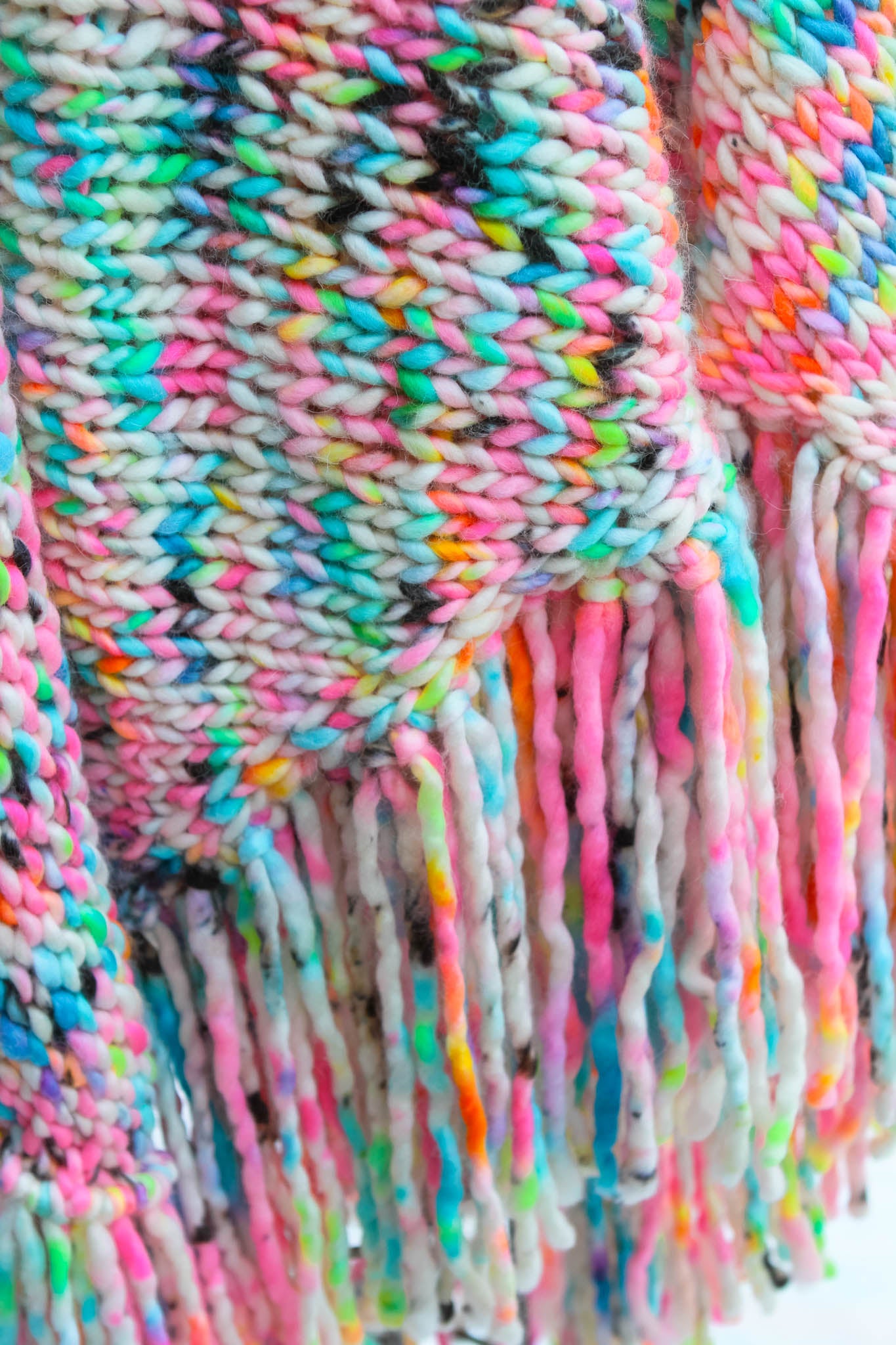 Multicolored knitted scarf with fringe. artisan fashion, couture shawl, floral art, luxury